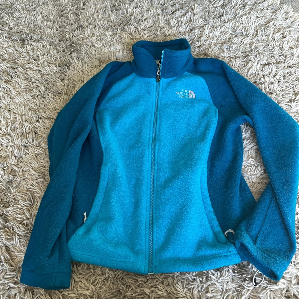 blue small north face jacket
